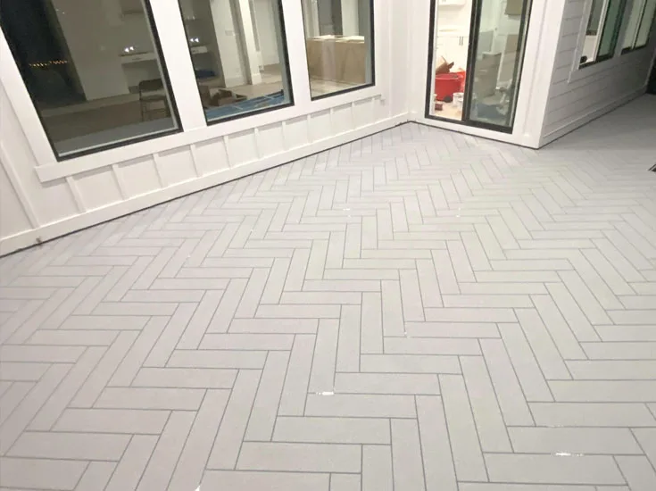 Waterproof deck coating on an exterior deck