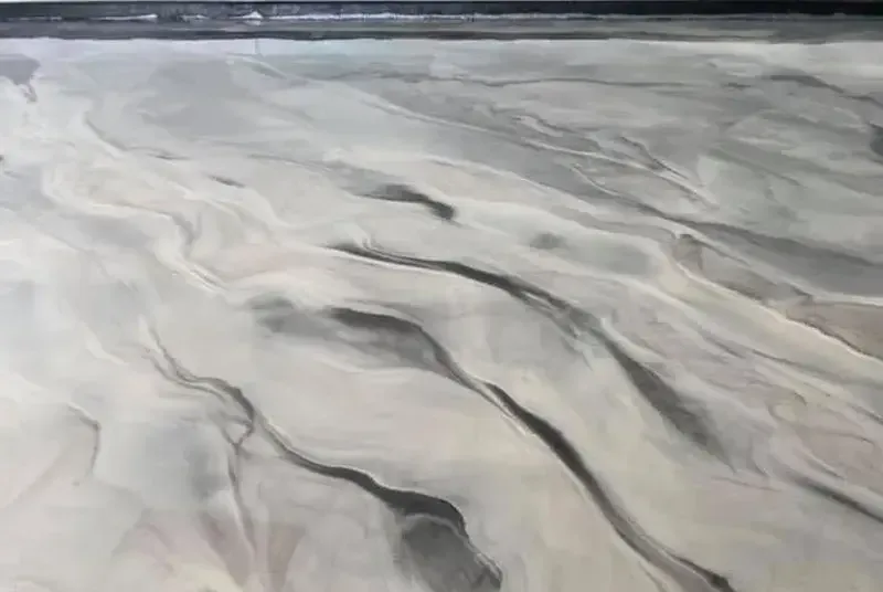 Metallic floor coating with swirled copper and dark pigment