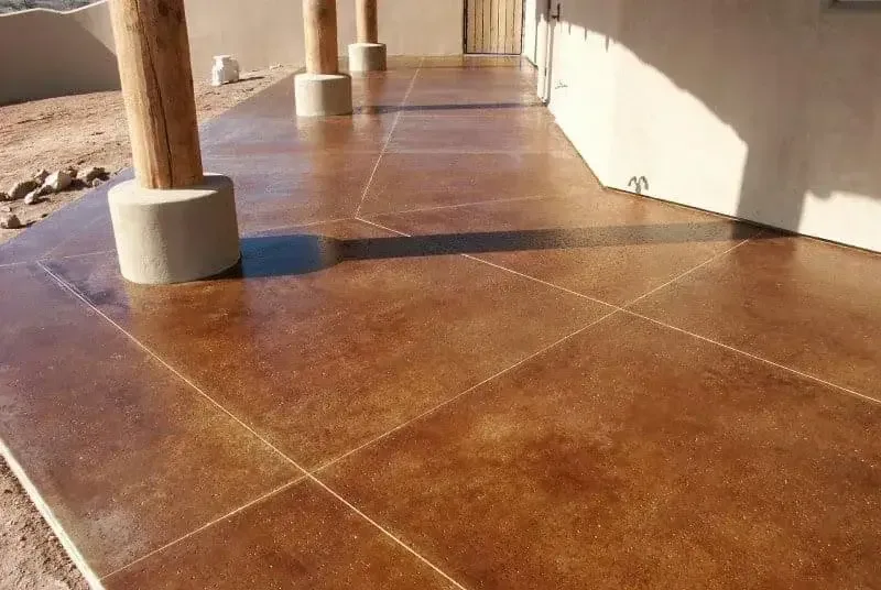 Stained concrete floor with mottled earth tones